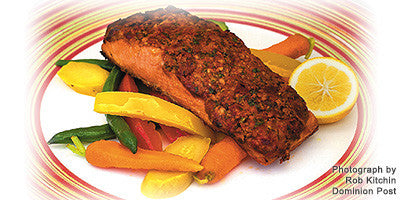 GRILLED SALMON FILLETS WITH SUNDRIED TOMATO PESTO ON A CRUNCHY VEGETABLE SALAD